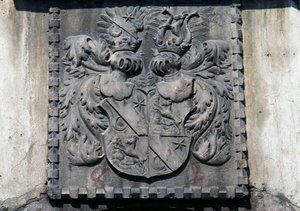 Coat of arms on wooden door of home in Lavis, Trento, Trentino-Alto Adige, Italy by Benjamin Baud