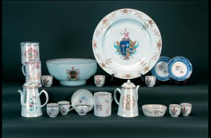 Dinner service including a pair of famille rose armorial saucers