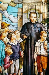 Don Bosco and children, stained glass window, Colle Don Bosco Sanctuary, Castelnuovo Don Bosco, Piedmont, Italy