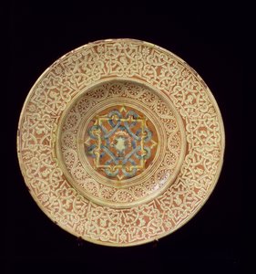 Maiolica Plate Decorated with an Elaborate Repetitive Knot Design Framing Profile Heads on the Border and a Shield in the Central Plaque, Italian, Made in Tuscany by Unknown