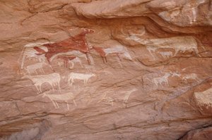 Rock art, Prehistory: Painting of a set of cattle in an ornate shelter, in the Uweinat massif, Sudan
