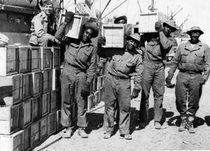 Second World War: Middle East April 1943: Members of a Port Battalion of the US Army unload military equipment