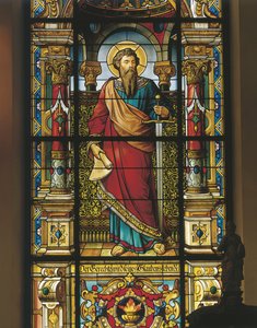 Stained glass window of a saint by William M. Timlin