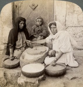 Women Grinding at the Mill, Palestine by Underwood and Underwood