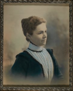 Young Woman Wearing White Lace Shirtwaist
