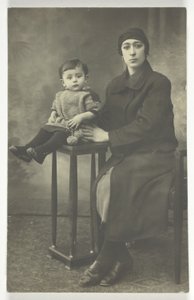 Untitled Postcard (Woman with Boy on Stand)