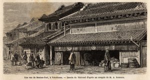 A street of Benten Tori with passers-by and porters