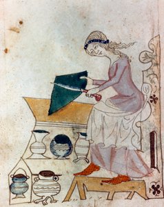 A young woman sharpening a knife