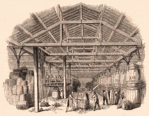 Interior of a tobacco factory: workers chopping a ball of tobacco and others involved in the manufacture and handling of barrels by Unknown
