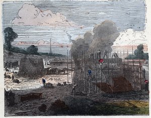 Manufacture of a brick in the 19th century: cooking. The bricks are laid in layers and then covered with earth before setting fire. Engraving late 19th century.