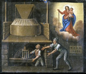 The Hand of a Young Worker is Caught in a Millstone