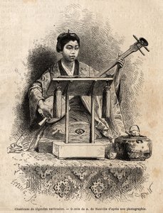 A singer of national legends, playing shamisen to accompany her song, sitting behind her desk. Engraving to illustrate the voyage to Japan, in 1863-1864, by Aime Humbert, minister of the Swiss Confederation, in 