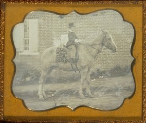Boy in Hat on Horse by Unknown artist