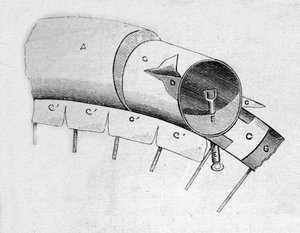 Cutting the pneumatic rubber of a bicycle invented by Englishman John Boyd Dunlop in 1888.