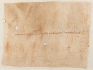 Fragment of a Garment with Embroidered Inscription