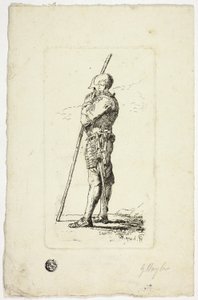 Man in Armor Holding Staff
