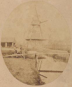 Painter in Hat at Easel Painting a Windmill by Unknown artist
