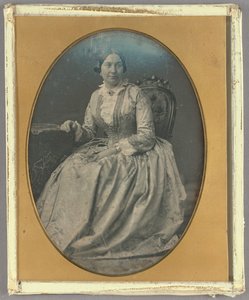 Portrait of a Seated Woman in Long, Flowing Dress