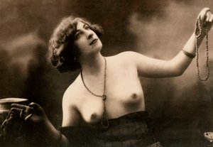 Half-length portrait of a partially nude young woman