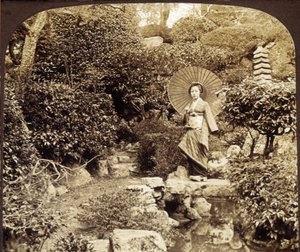 Japanese kimono umbrella in a garden - photography, late 19th century by Unknown photographer