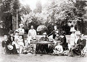 Members of the British Royal Family including King George V, King Edward VIII around Queen Victoria at a garden party by Unknown photographer