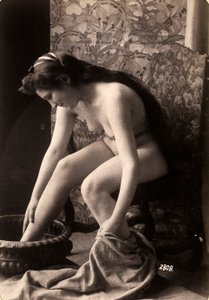 Portrait of a Nude Woman Washing Her Feet by Unknown photographer