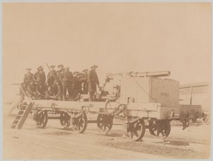 Sailors from HMS Hecla manning a naval gun mounted on railway flat wagon, Egypt