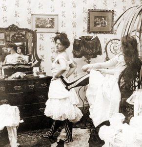 Stereoscopic Card Depicting a Woman Being Laced into a Corset, c.1900