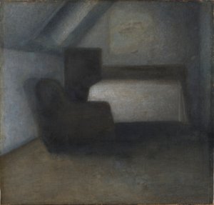 Attic Room with a Table and Chair