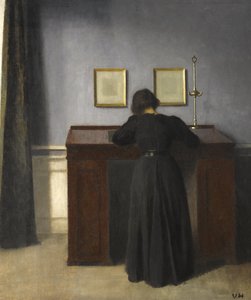 Ida Standing at a Desk