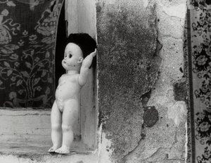 Doll on a Window Sill by Vincenzo Balocchi