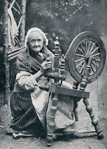 An Old Irish Woman at Her Spinning-Wheel