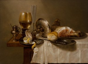 A Still Life with a Roemer, An Overturned Silver Tazza, a Flute, a Bread Roll and Ham on a Table