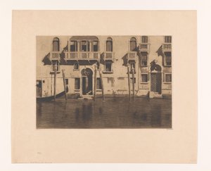 View of facades and mooring posts along the Canale Grande in Venice