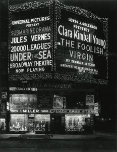 1554 Broadway at 46th Street, I. Miller Shoes; James Drug Store, and Large Marquees for Movies Lit Up Above by William Davis Hassler