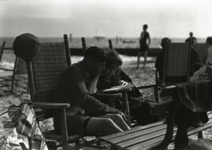 Couple Reading on Beach, Coney Island, c.1910-21 by William Davis Hassler