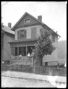 Four Children Pose on the Porch of a House on a River or Lake, Inwood, New York, c.1910