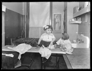 Unidentified Little Girl Demonstrating the Use of an Electric Iron by William Davis Hassler