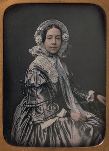 Seated Middle-aged Woman Dressed in Finery
