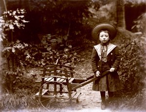 Girl with Cart in a Garden, Early Twentieth Century by . .