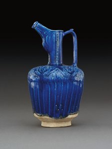 Nishapur moulded monochrome cobalt-blue glazed pottery ewer, Eastern Iran by School Iranian