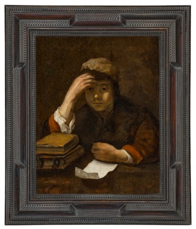 A Boy Reading by (studio of) Rembrandt Harmensz. van Rijn