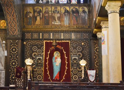 Interior of The Hanging Church in Old Cairo, historic Coptic Orthodox church with icons and wooden iconostasis by Albert Mansour