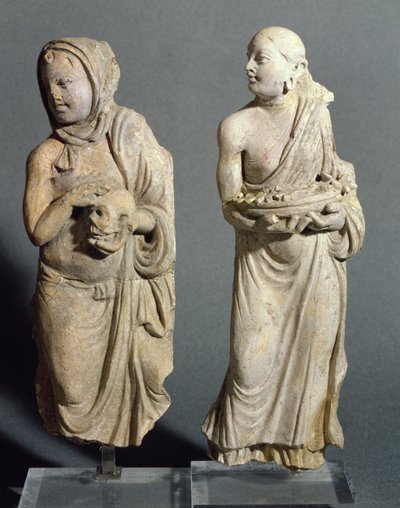 Two statuettes of standing monks, from Hadda by Afghan School