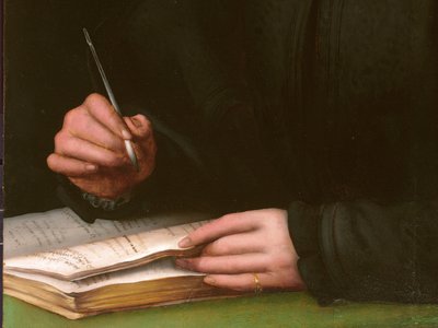 Portrait of a young man with a book by Agnolo Bronzino