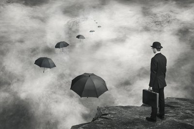 Man and Floating Umbrellas by Alain Villeneuve