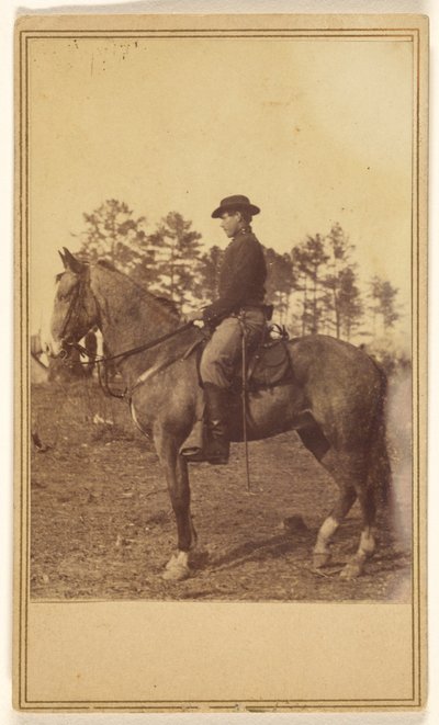 Man Wearing a Hat, in Profile, on Horseback by Alexander Gardner