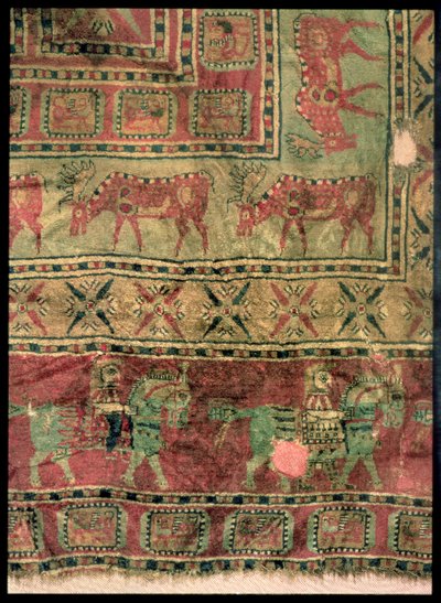 Pile carpet depicting horses and riders, fallow deer and griffins, from the Pazyryk Burial Mounds, 5th-4th century BC by Altaic School