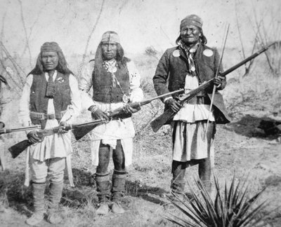 Geronimo and three of his Apache warriors by American Photographer
