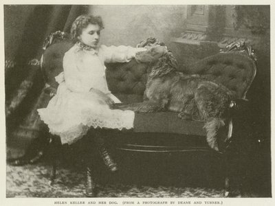Helen Keller and her dog by American Photographer